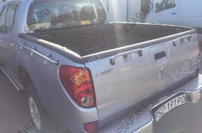 Mitsubishi L 200 2009 год Tylna Paka